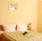 łóżka w Hotelu Trzy Światy w Gliwicach